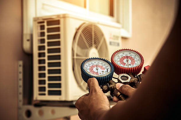 Professional Hvac technician working in Elm City, NC